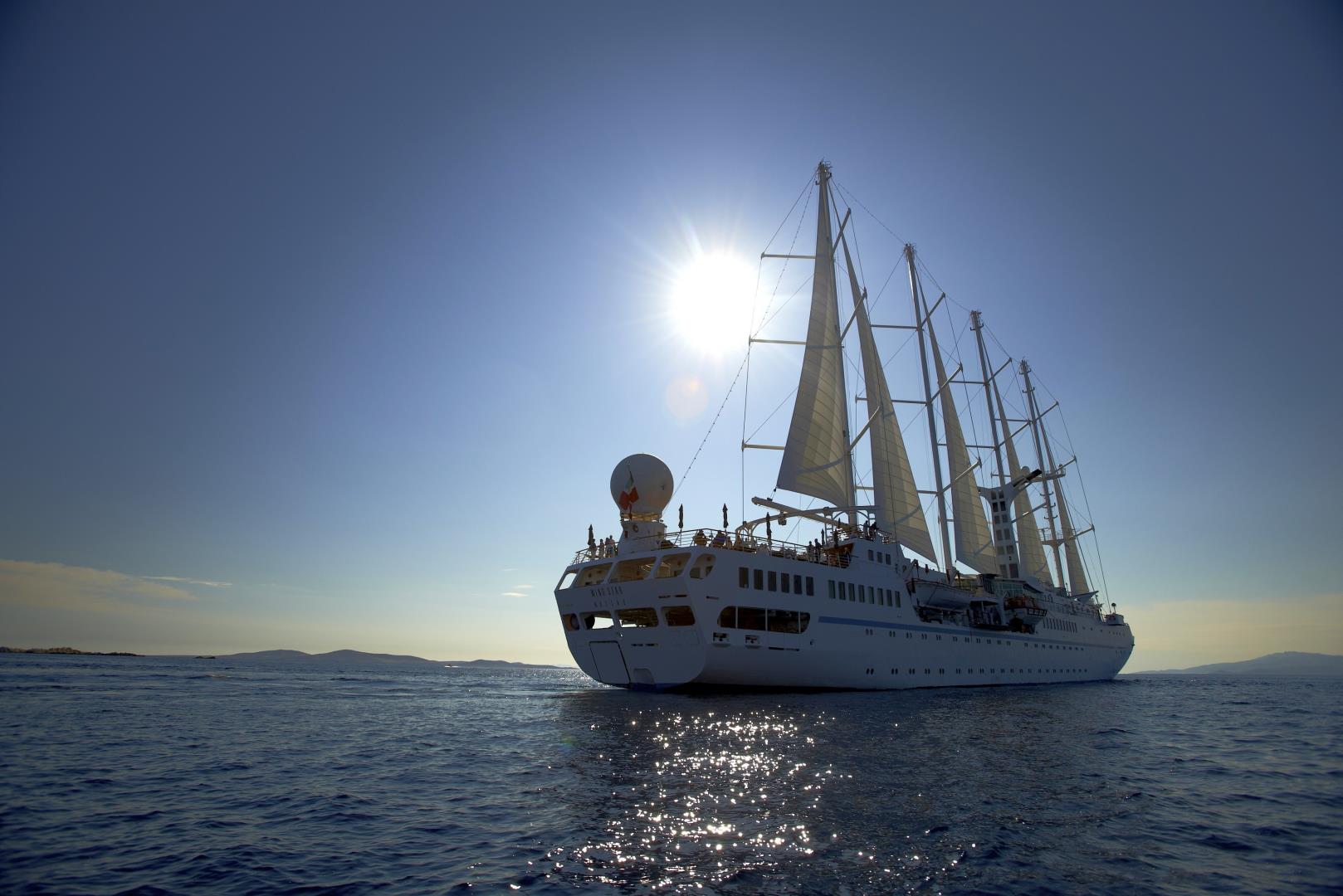 Exterior view of Wind Star sailing near Mykonos, Greece - Photo Credit: Roger Paperno
